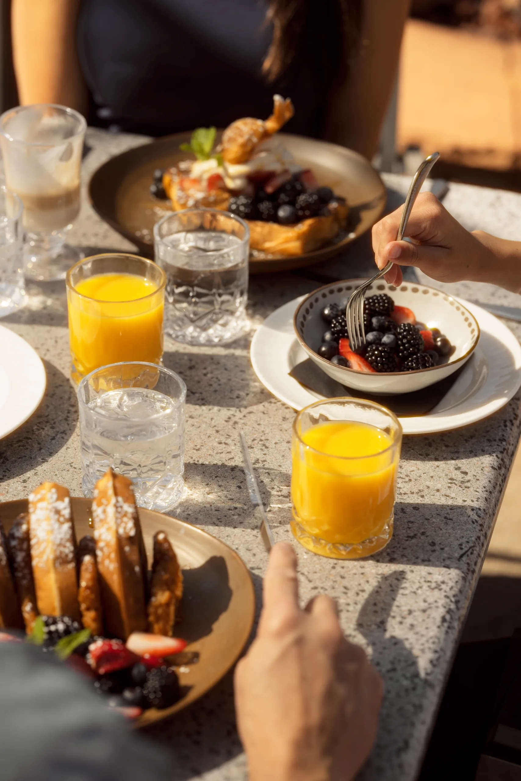 Breakfast on the terrace in morning sun