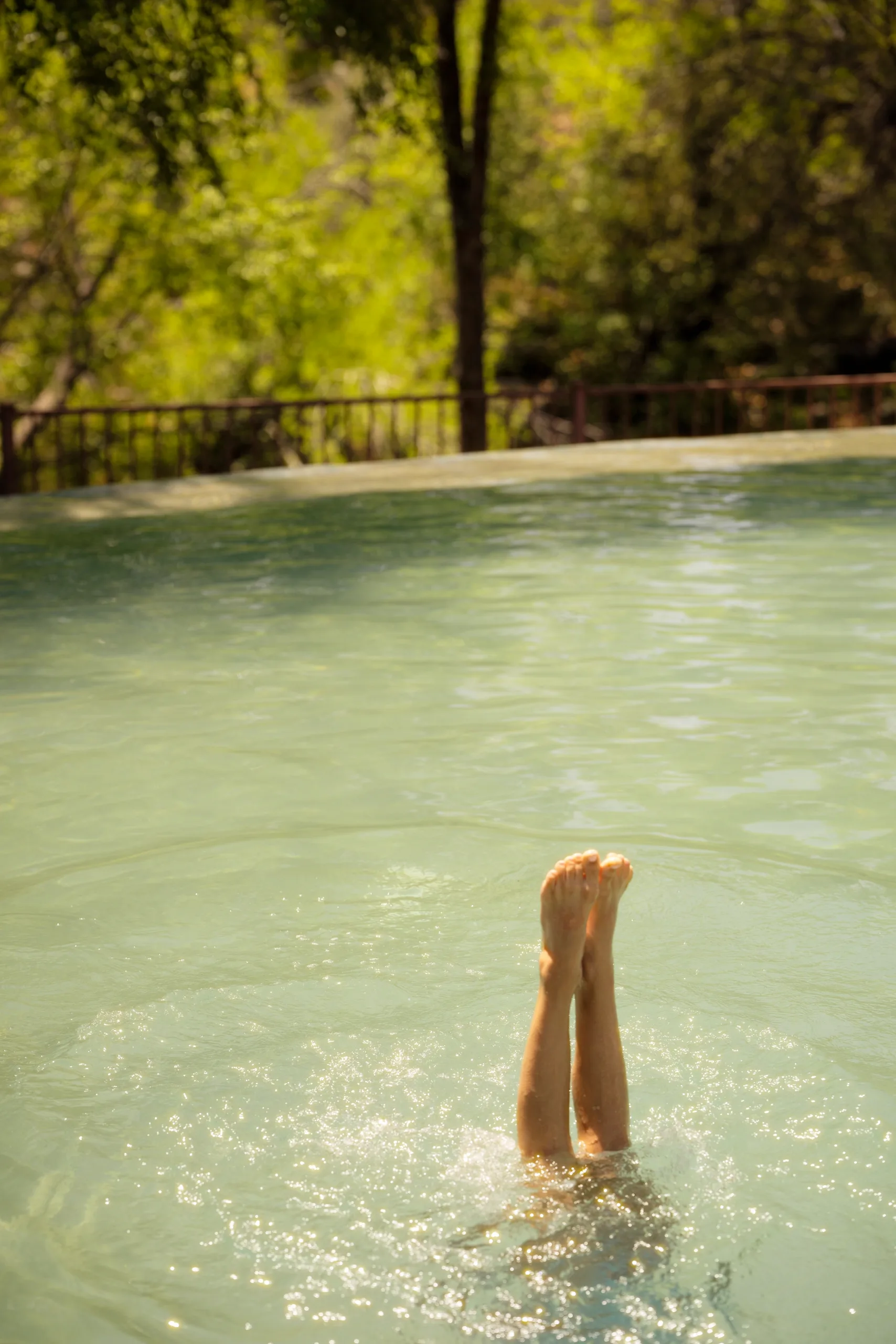 A handstand in the pool