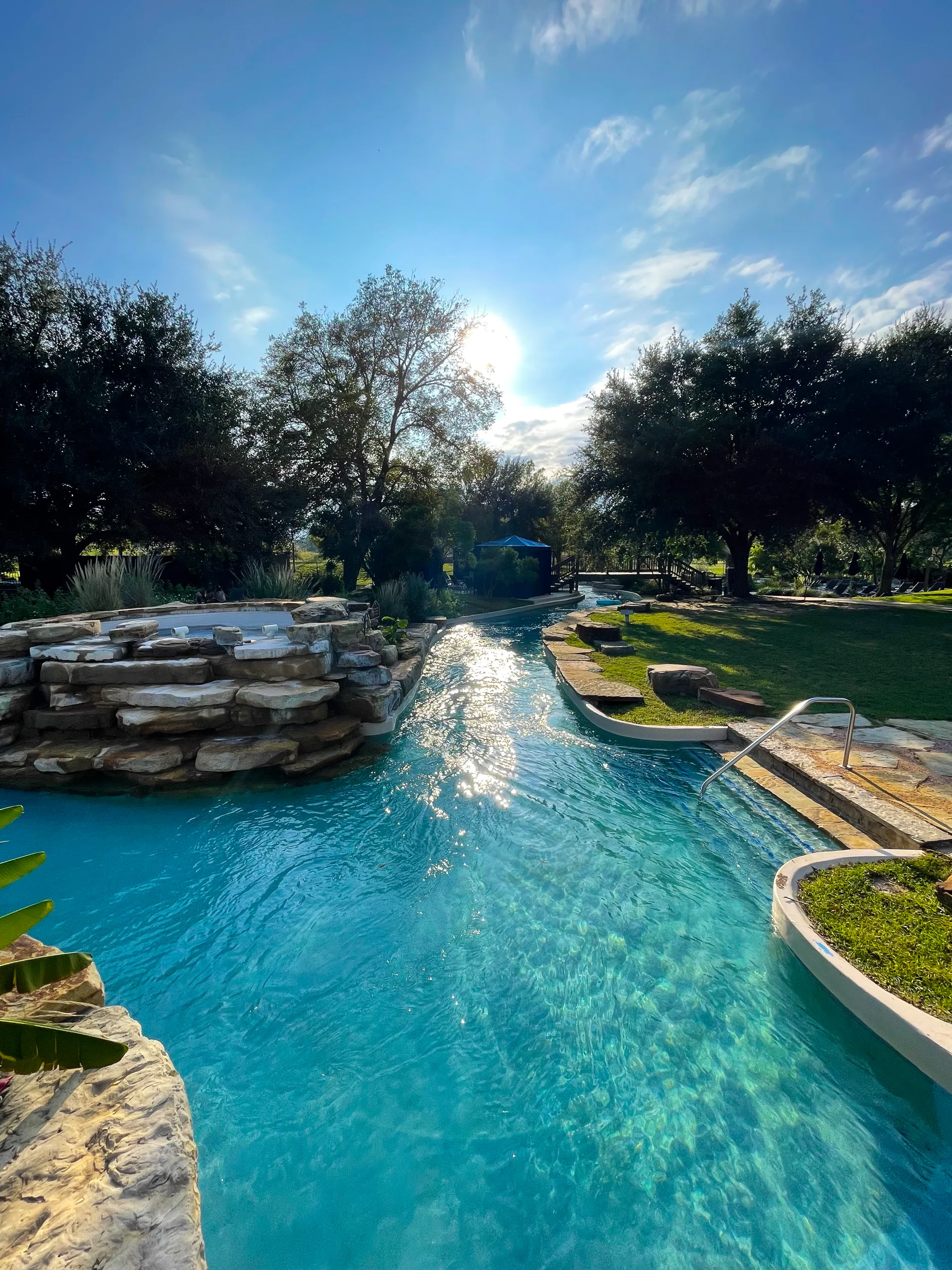 The lazy river winding through the oaks