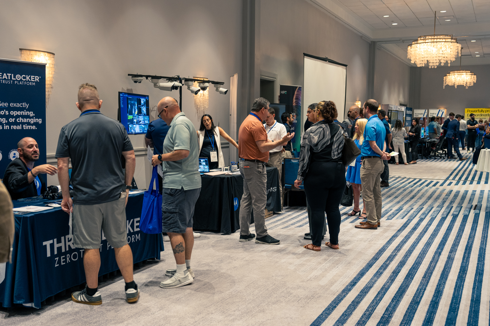 Attendees at an expo in the ballroom